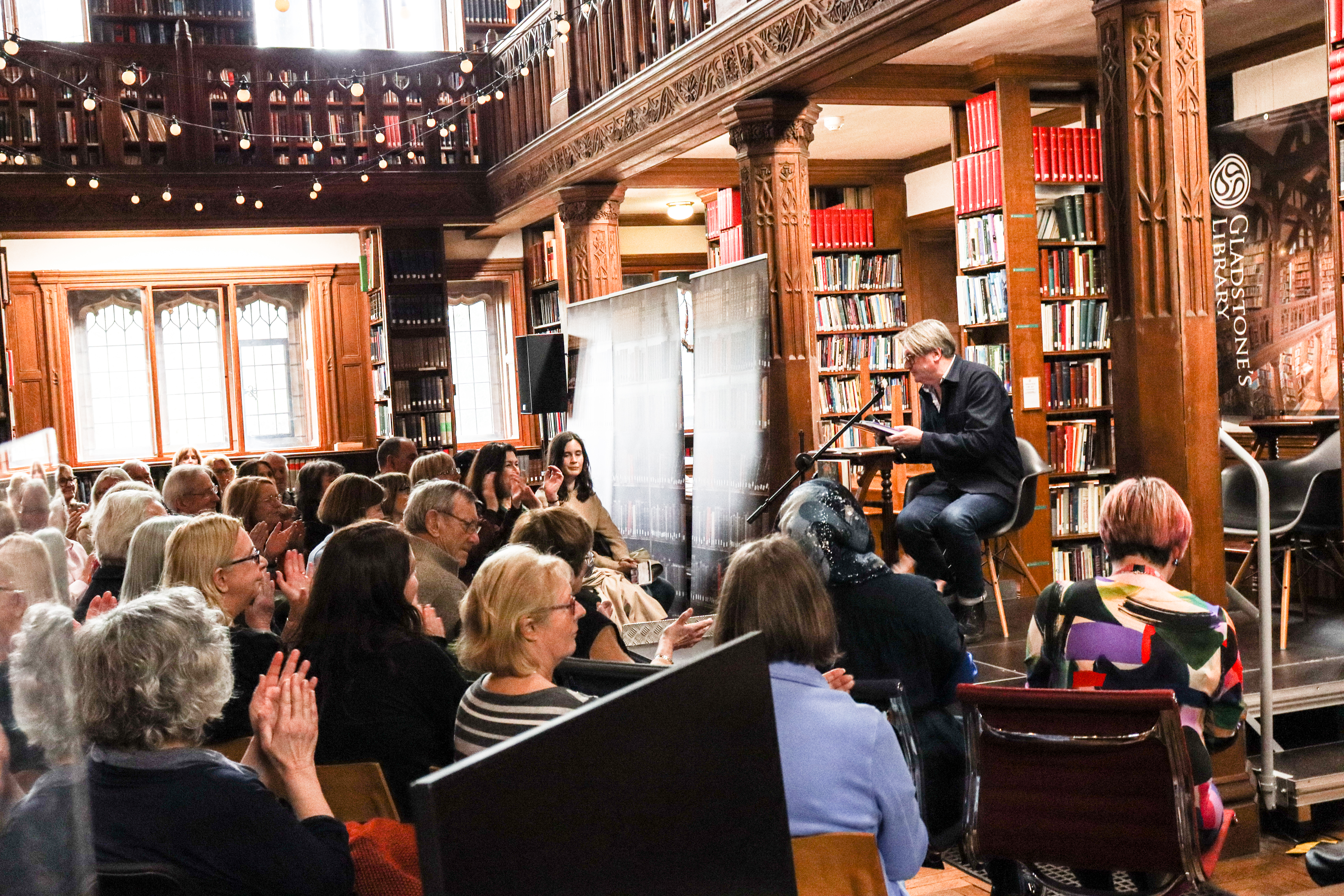 A full audience in the Theology Room