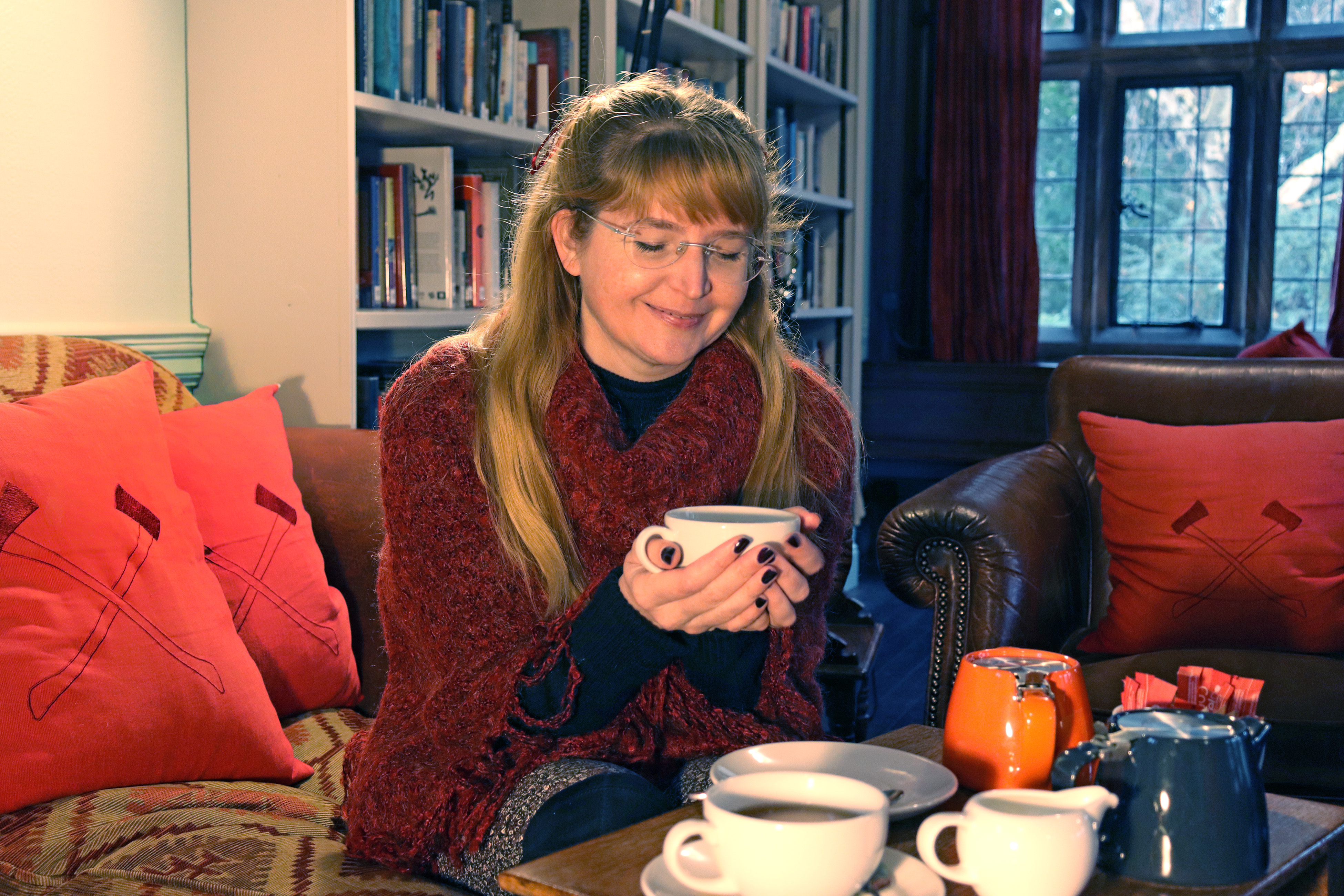 Sophie Rickard contemplating a cup of tea in the Gladstone Room