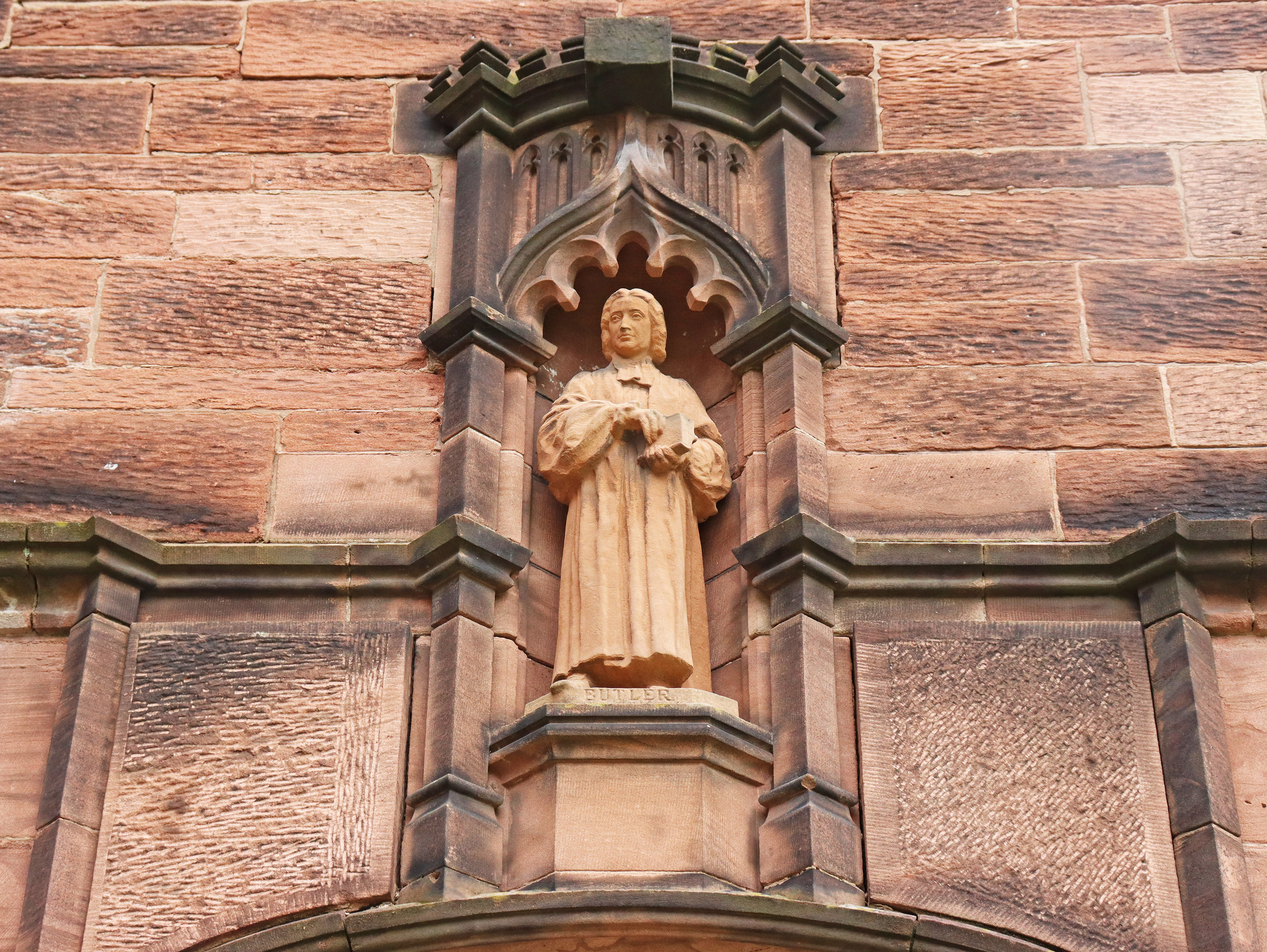 A sandstone sculpture of Butler